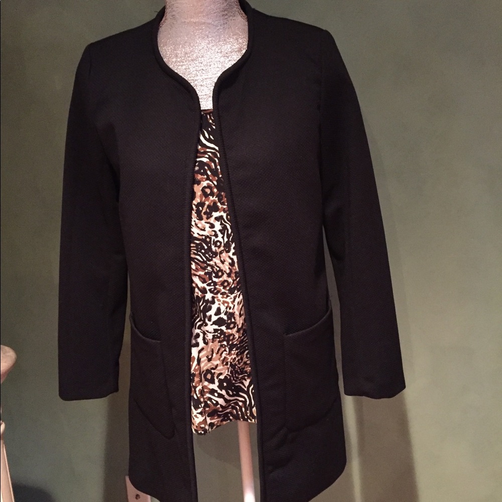 Black blazer never worn.